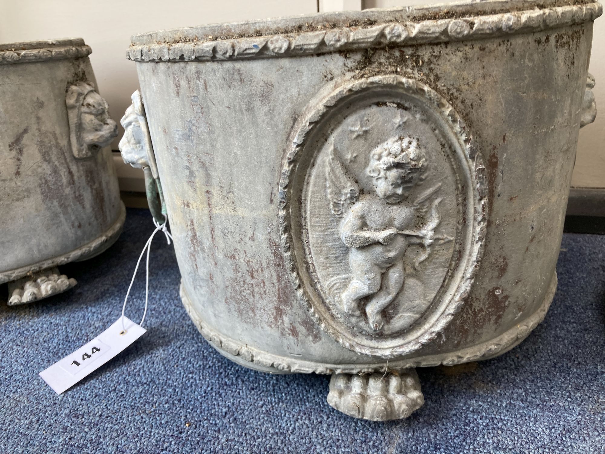 A pair of Victorian lead circular garden planters, 28cm diameter, height 22cm